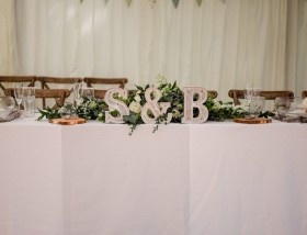 S&B light up letters on table